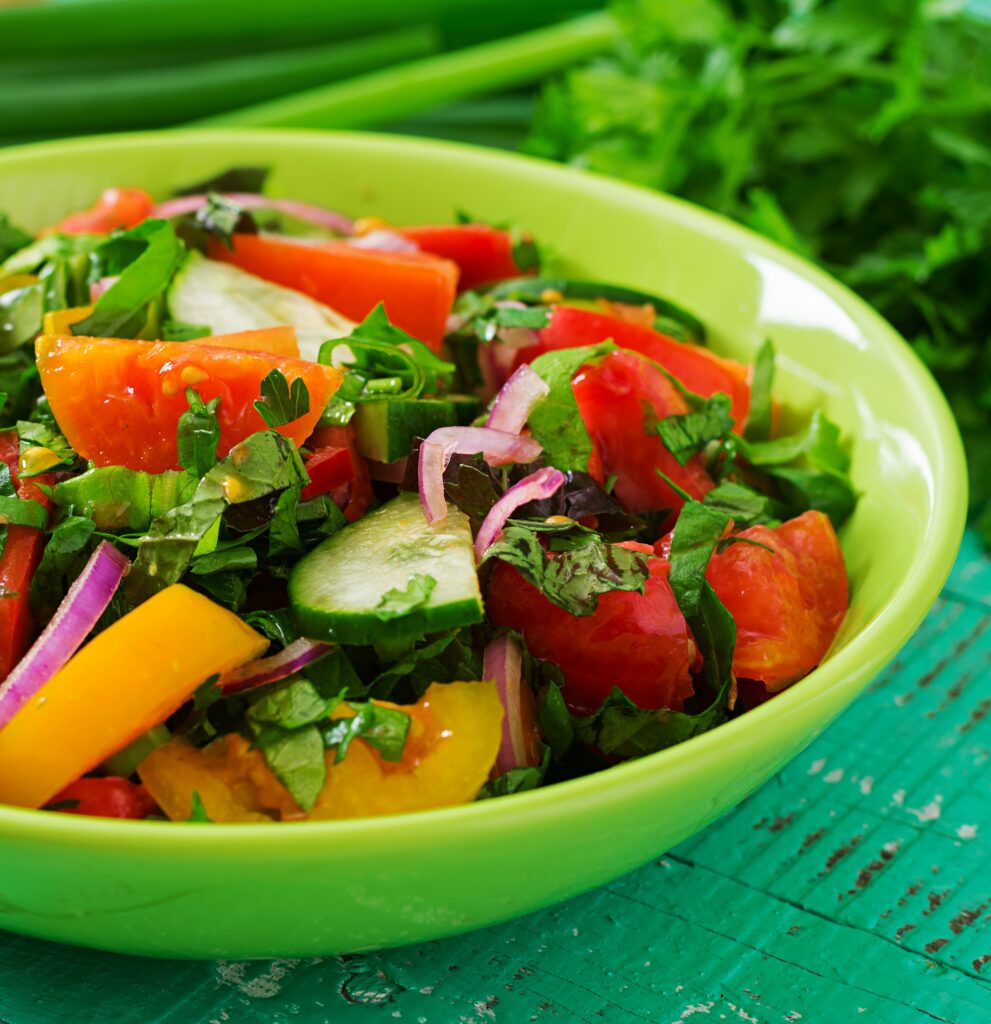 Fresh Salad Of Tomatoes, Cucumbers, Peppers, Arugula And Red Oni