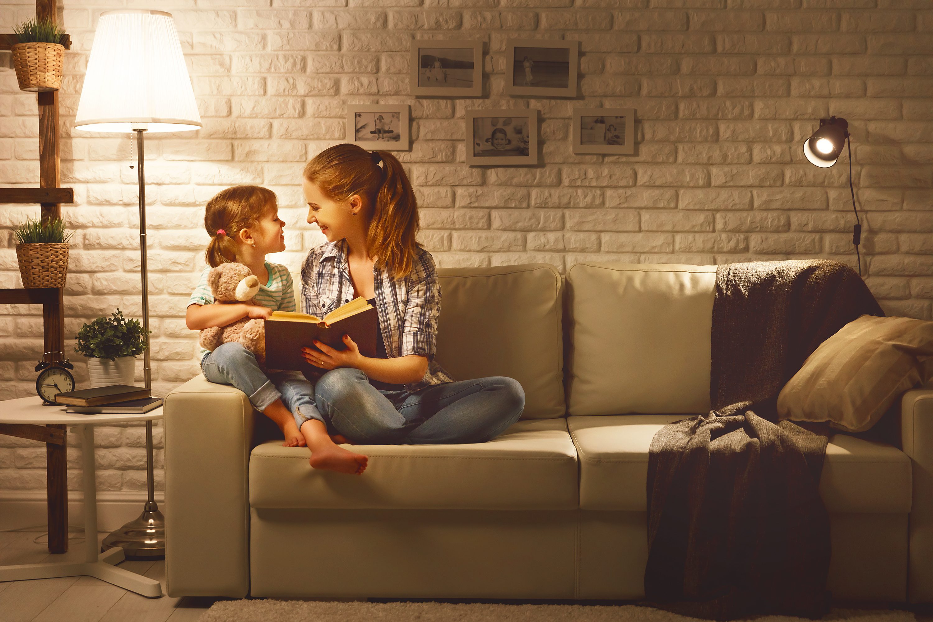 Family before going to bed mother reads to her child daughter book near a lamp in the evening E27 Bulb LED Warm 12W