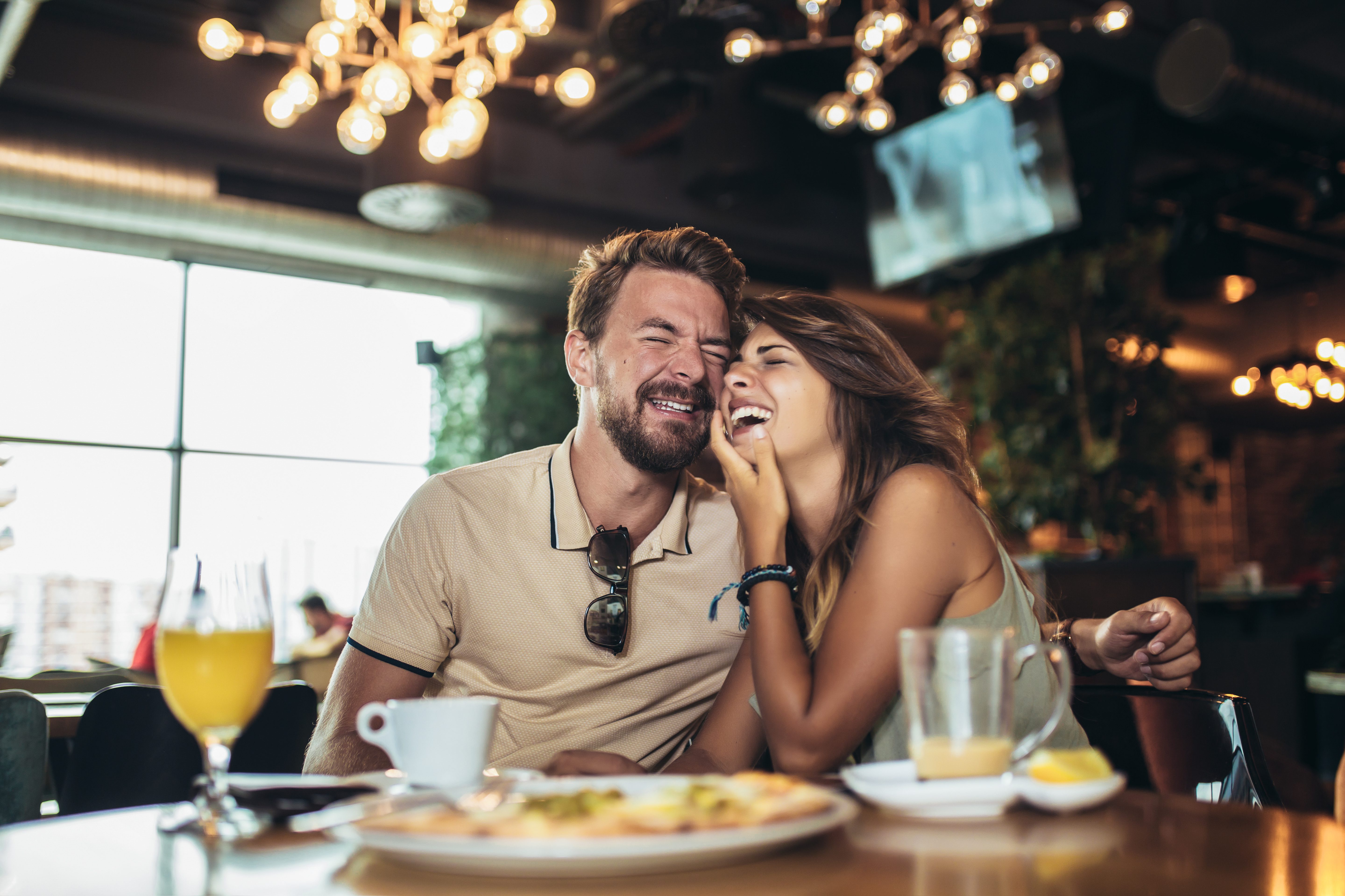 Young happy couple eating pizza in a restaurant LED Bulb Spot GU10 Retro