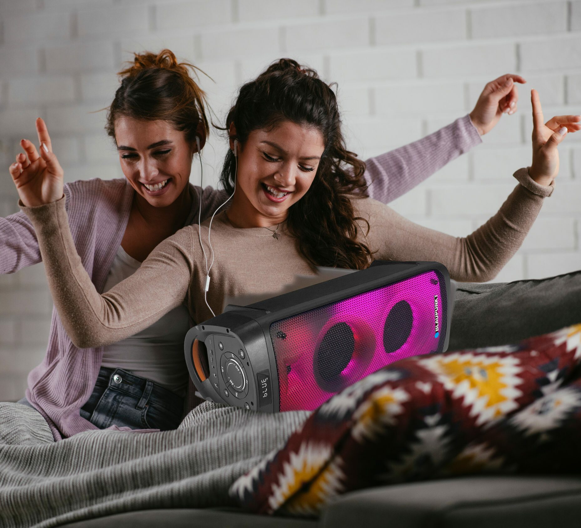 Girlfriends,Dancing,And,Listen,Music,From,A,Laptop,Computer,At