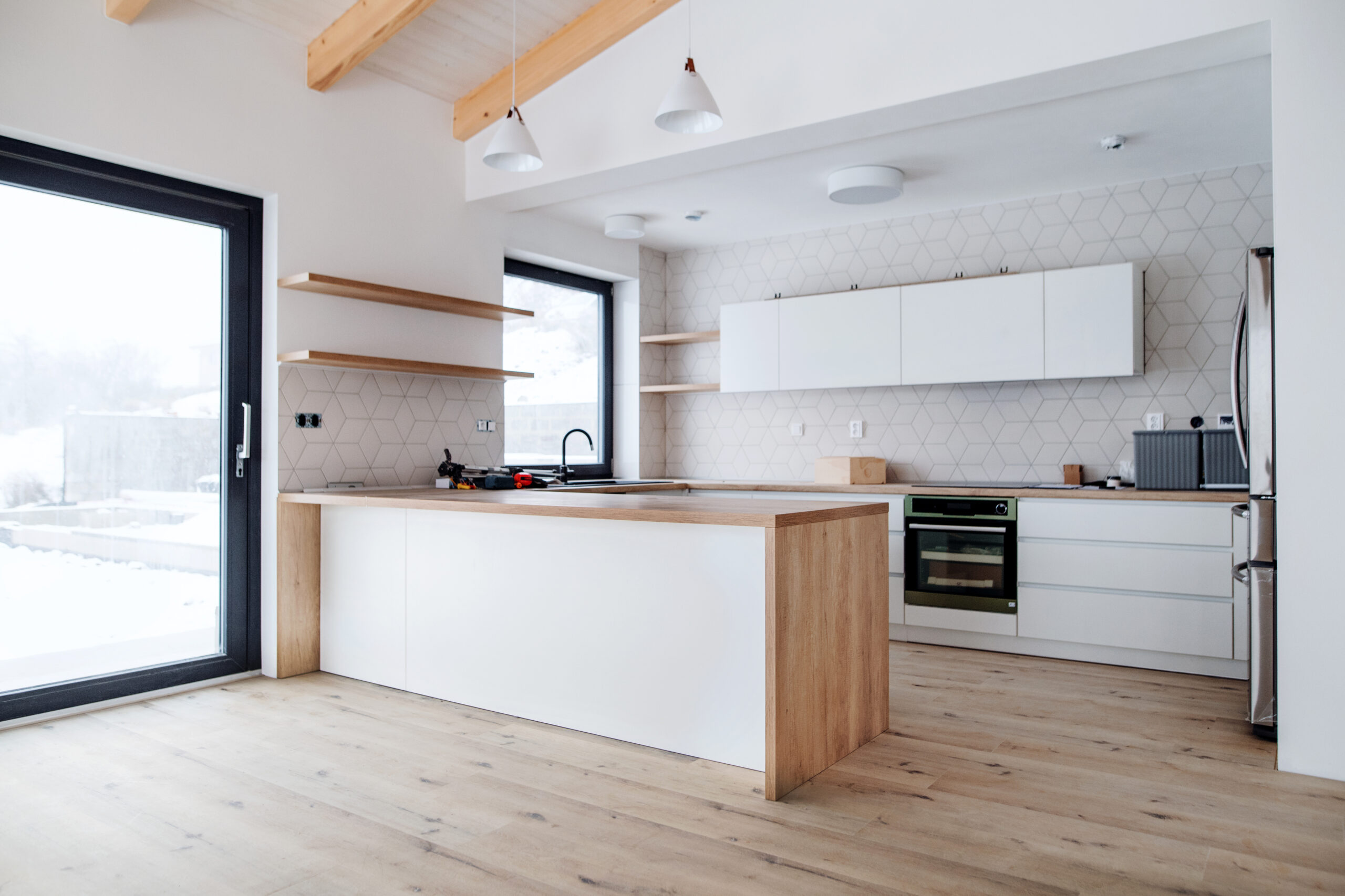 A Mature Man With His Senior Father Furnishing New House, A New Home Concept.