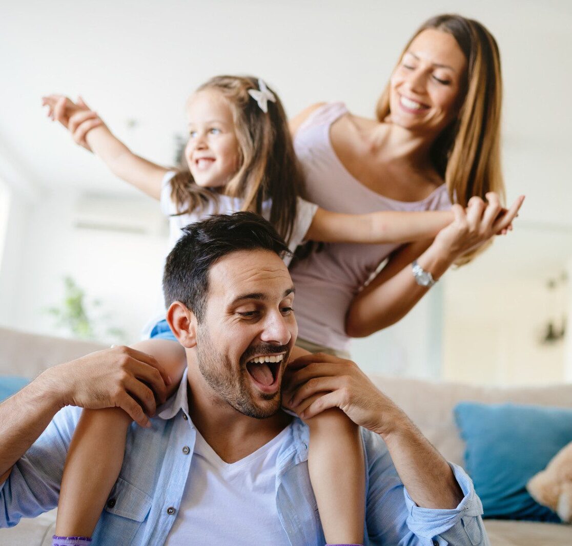 Happy family having fun times at home